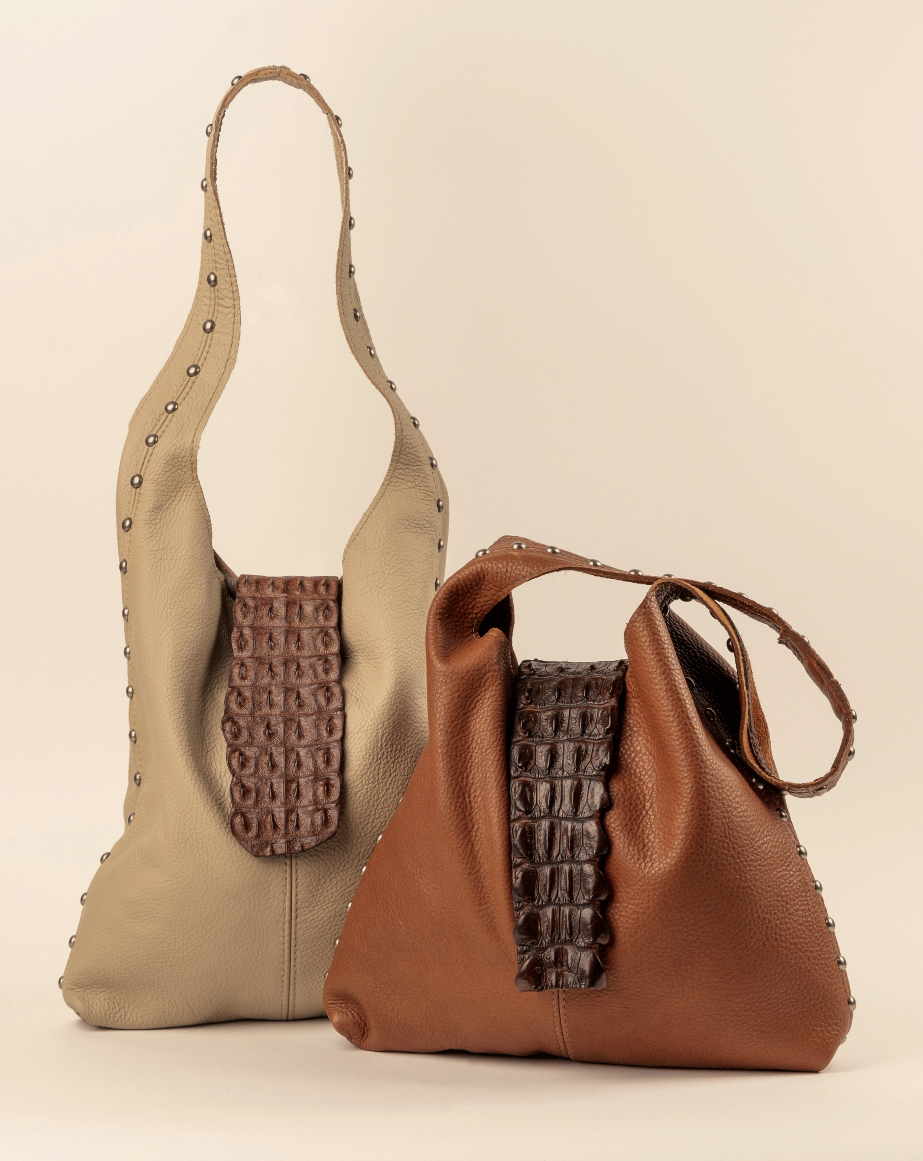 Tan leather with sliver spots slouch bag