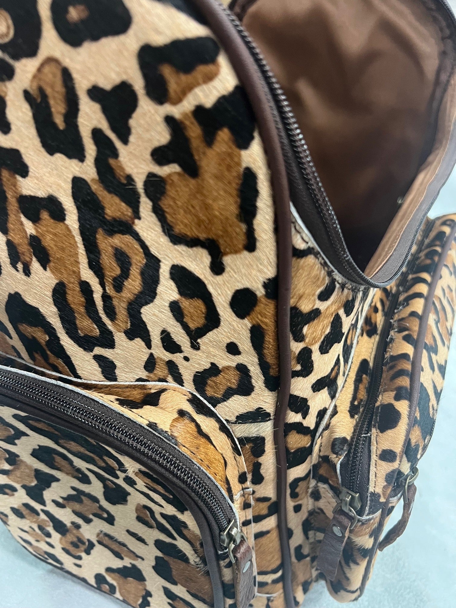 Leopard print leather online backpack